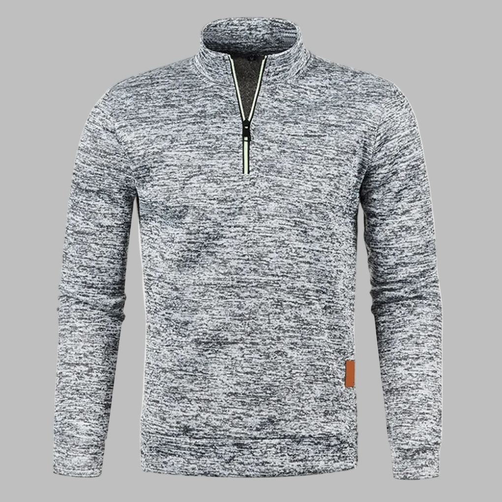 Grijze herenfleece met halve rits, comfortabele pasvorm, ideaal voor outdooractiviteiten. Stijlvolle en warme trui voor herfst en winter.