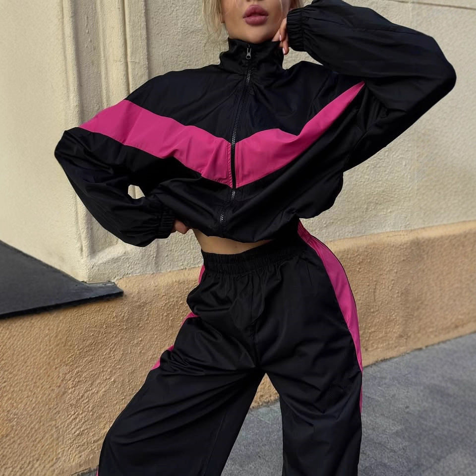 Women's sporty windbreaker with high collar and contrasting stripes Chic & Stil