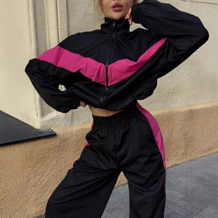 Women's sporty windbreaker with high collar and contrasting stripes Chic & Stil