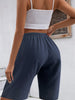 Comfortable women's sports shorts with elastic waistband and practical pocket design Lune London