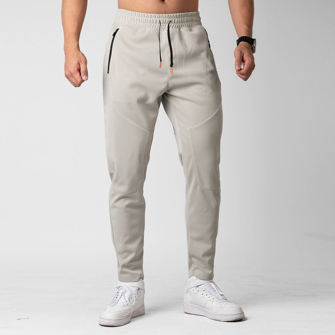Men's sporty jogging pants with an innovative breathable structure and practical zippered pockets Lune London