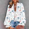 Lune London women's blouse with a playful floral print and lace edges