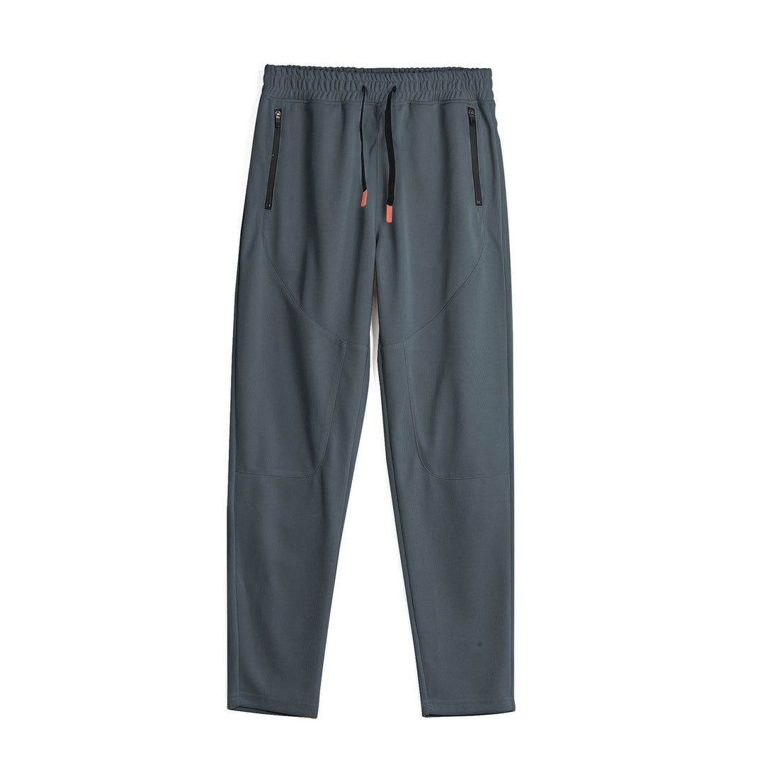 Men's sporty jogging pants with an innovative breathable structure and practical zippered pockets Lune London