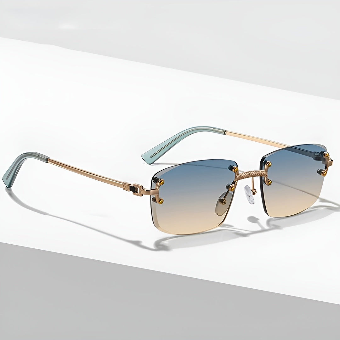 https://cdn.shopify.com/s/files/1/0943/0581/2804/files/sunglasses-rimless-gradient-lenses-uv400-protection-gold-1.jpg?v=1777615446