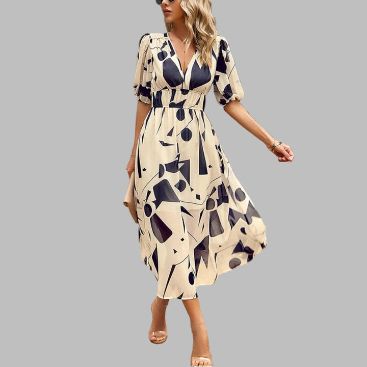 "Women's casual V-neck midi dress in breathable cotton, features short sleeves and a relaxed silhouette for summer comfort."